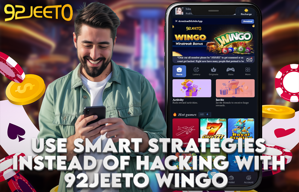 A picture of a man holding a phone showing the 92Jeeto Wingo hack.